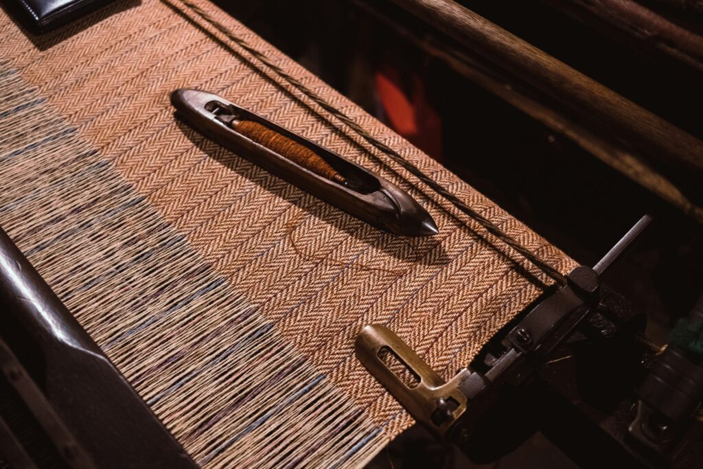 Detail of loom weaving a blanket